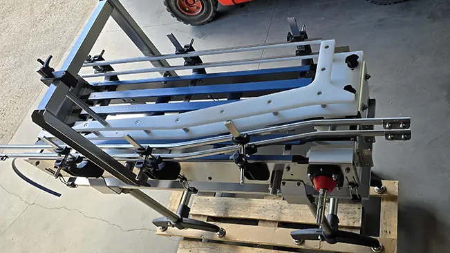 Product handling and line equipment integrated with a conveyor system